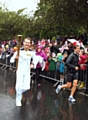 Josh Simpson, who is a member of Full Contact Performance and a fight team member with Full Contact, carring the Olympic Torch in Lancaster on Friday 22 June