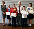 Winners of the design a card to send to The Queen competition with Sue Furby and John Brooker from The Rotary Club of Middleton 