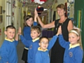 Elaine Hibbert and pupils from Hollin Primary School in Middleton celebrate their outstanding Ofsted report