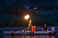 The Jubilee Beacon at Hollingworth Lake being lit by Sailing Club Bosun Brian Small