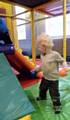 Edward gets to grips with the ball pool