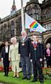 The Mayor and Mayoress accompanied by Sana Khan and Lewis Threlfall at the flag-raising ceremony, with some of the Heritage Walk participants in the background 
