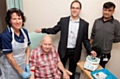 Liz Johnson, research nurse, Dr Jason Raw and Dr Ansari, speciality grade physician, with a patient taking part in the study