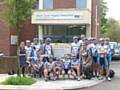 The team take a break outside the Marie Curie Hospice