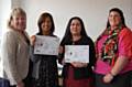 Lesley Mort, Interim Accountable Officer presents Fozia Waseem and Shabnam Sardar with their Going for Gold Stars award along with nominator Karen Hurley