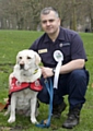 Echo with his owner and handler Mike Dewar