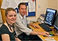 Dr. Andrew Ustianowski, Consultant in Infectious Diseases at North Manchester General Hospital, with junior medic Dr Celia Hogan