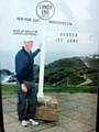 Paul Sheerin at the start of his mammoth charity trek from Land’s End to John O’Groats - with nothing but the sign on his back