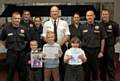 Ben, Daniel and Ella with Borough Manager Tony Lander in the white shirt and other members of the crew and fire safety team