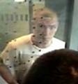 Still image from CCTV of suspect who boarded the number 17 bus after the assault and robbery