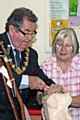 Mayor Peter Rush wood carving helped by Glynnis Cruice