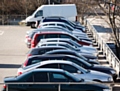 Parking permit costs slashed
