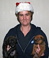 RSPCA Animal Centre Deputy Manager Chan Taylor with puppies Jessie and Aston