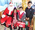 Father Christmas visits Hamer School Fair