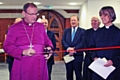 The Bishop of Middleton, the Rt Rev Mark Davies cuts the ribbon to officially open the new St Andrew's Church community centre