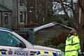 Police at the murder scene in Littleborough