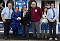 Blue Rose Gifts staff receive their prize from Mayor Peter Rush