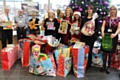 Council staff Giving Back Riverside Charity Committee donated more than 300 gifts to a charity present appeal