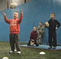 Samuel Ellis showing off his handling skills, watched eagerly by team mates Jamie Howe, Billy Pickering and Tyler Kenwright
