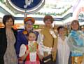 Cast members of Pennine Panto Players appearing in full costume at the Rochdale Exchange shopping centre to promote their latest production