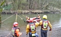 Firefighters faced a fast flowing weir during a joint training exercise