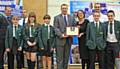 Carole Fisher, Deputy Head Teacher and some of the Year 8 pupils accepting the Community Team Pupil of the Year Award