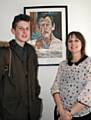 Luke McDaid, a first year fine art student at Hopwood Hall College with his copy of a Lucian Freud self portrait, and Yvonne Hall 