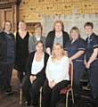 Gilly Keogh with care home managers Charlotte Goodwin, Chris Taylor, Sally Smedley, Christine Baines, Pauline McManus, Carol Young and Gail Gallagher