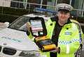 PC Terry Green with a defibrillator