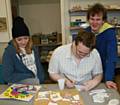 Jeigar Stead, 17, from Littleborough (left), William Vennard, 18, from Rochdale (centre) working on his Rochdale Hornets tile, Christian Hutchins, 21, from Milnrow 