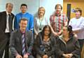 Councillor Colin Lambert, Tony Foster, Tracy Butler (Tutor), Shaun Donnelly, Elaine Launder.  Front row, left to right: Jim Taylor (Chief Executive RMBC), Naseem Massum, Yasmin Kauser