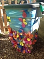 Pupils from St Edward's CE Primary School, decorated bin proved to be blooming marvellous as the judges panel awarded them first prize in the under 11s category