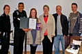 Samantha Hammond receiving her Police Certificate of Merit from Inspector Umer Khan