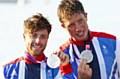 Stuart Bithell (on the right) with his sailing partner Luke Patience, after winning their Olympic 2012 silver medals