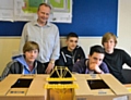 Jack Fitton, Ian Stickler (Carillion Project Manager, Wardle High School project), Lewis Dalton, Robbie Thompson and Jake Ramsden with their model bridges