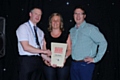 Andy Glover presents Best Pub award to The Baum owners Simon and Heidi Crompton