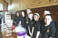 Young RBH tenants show the Mayor of Rochdale, Cllr Peter Rush, their “Not Just A Little Business” fair trade stall while celebrating Co-operatives Fun Day in Rochdale Town Hall