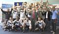 Deaf Rhinos FC team picture with manger and former Hopwood Hall student Rukon Rahman (far left), MP Jim Dobbin (centre) and Hopwood Hall Football Development Officer Dewan Choudhury (far right)