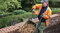 Volunteer Paul Rigby gets stuck in
at Middleton Cemetery, by St Leonard’s Church

