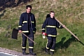 Fire-fighters tackle moorland fire at Blackstone Edge earlier this month