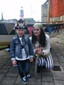 Chloe Hurdiss collects her treasure trail prize from pirate leader Elaine Stott