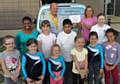 Karon Tensel; Keith Trinnaman, Rotary Club of Middleton Vice President & Treasurer; Lisa Lee, Head Coach;  and a class from the Middleton Trampolining Club held at St Anne’s Academy