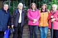 Tour guide Anne Thomas (far right) with visitors