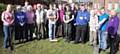 Emma McHale, left, with fellow Team members. The Team completed garden improvements at Arnold Bagnall Court residential home in Rochdale