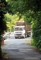 Unsheeted fully loaded wagon  after it had reversed back down Spod Road (TBA site exit road). The photograph was taken at about 3.30pm Wednesday (27/8/13) from the highway on Rooley Moor Road. In the area around the nearside front wheel arch a green sheet can be seen neatly folded. This is the cover sheet that was attached to the wagon 10 minutes later.