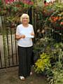 Bernice Clark, winner of Rochdale’s Alley in Bloom Competition 2013, surrounded by some of the stunning plants and flowers she and friend Sue Thomas have introduced to transform a previously vandalised alleyway