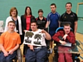 RMBC Deputy Chief Executive Linda Fisher (back second left) joins staff and participants to celebrate the Sunsport celebration