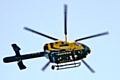 The police helicopter circling above Castleton to help locate a burglary suspect