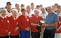 Rochdale Heartbeat presenting an anniversary defibrillator to Rochdale Cricket Club