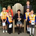 Front row: Quinlan Otterly O’Conner, Louie Harris, Councillor Janet Emsley, Grace Harris and Darcey Harris (winner)<br />
Back row: Jane George (headteacher) and Nick Jordan (Network Rail)
